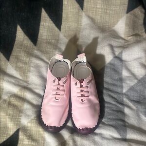 Pink Moccasins sturdy soles.